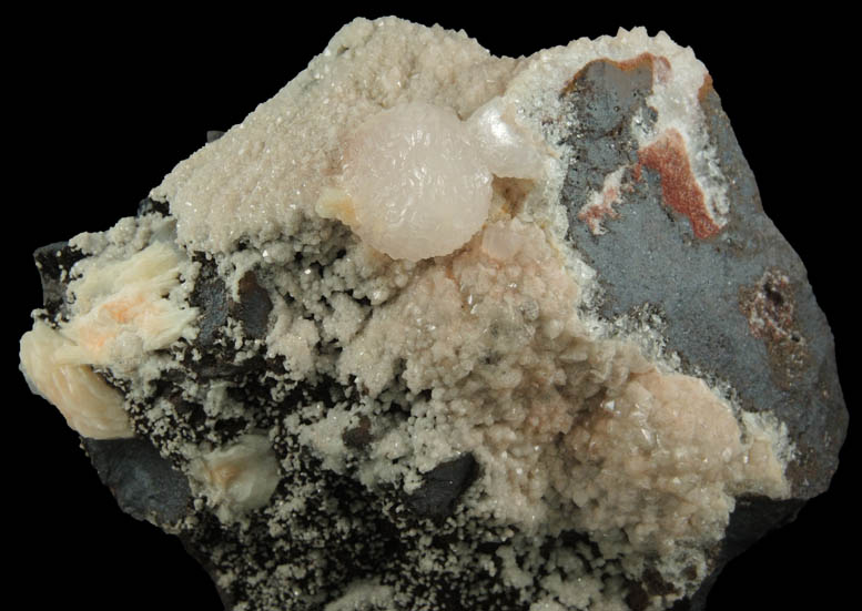 Calcite var. Manganoan Calcite with Barite and Quartz over Hematite from Montreal Mine, Gogebic Iron Range, Iron County, Wisconsin