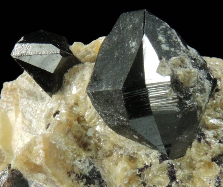 Cassiterite (twinned crystals) on Talc with minor Fluorite from Ehrenfriedersdorf, Erzgebirge, Sachsen, Germany