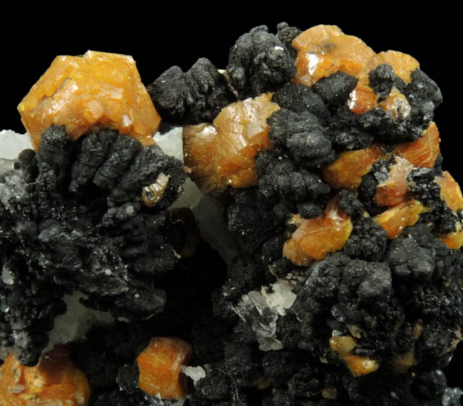 Mimetite var. Campylite with Psilomelane on Barite from Drygill Mine, Caldbeck Fells, 16 km WNW of Penrith, Cumberland, England