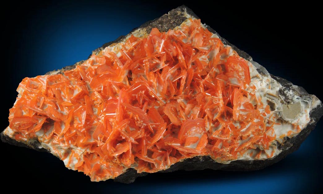 Wulfenite on Calcite from Jianshan Mine, Kuruktag Mountains, 300 km southeast of rmqi, Shanshan County, Xinjiang Uygur Region, China