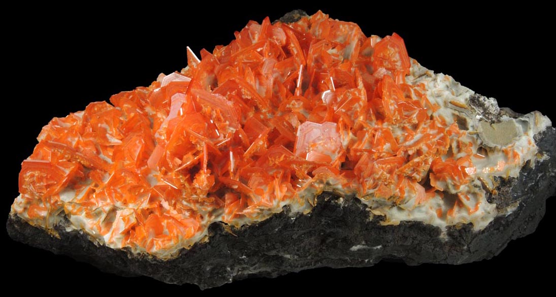 Wulfenite on Calcite from Jianshan Mine, Kuruktag Mountains, 300 km southeast of rmqi, Shanshan County, Xinjiang Uygur Region, China