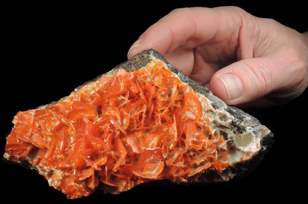 Wulfenite on Calcite from Jianshan Mine, Kuruktag Mountains, 300 km southeast of rmqi, Shanshan County, Xinjiang Uygur Region, China