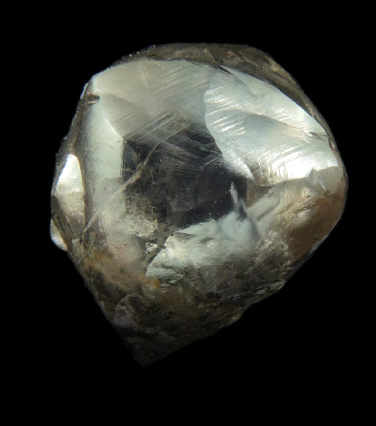 Diamond (10.35 carat large gray lamellar-twinned irregular uncut diamond) from Sakha (Yakutia) Republic, Siberia, Russia