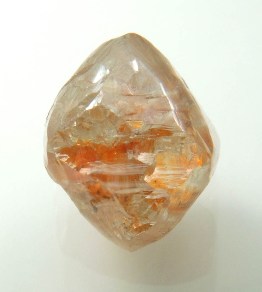 Diamond (8.63 carat red-orange octahedral uncut diamond) from Mirny, Sakha Republic, Siberia, Russia