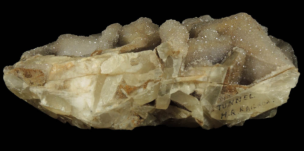 Calcite with Quartz coating from Hudson River Railroad tunnel, Anthony's Nose, east shore of Hudson River, Westchester County, New York