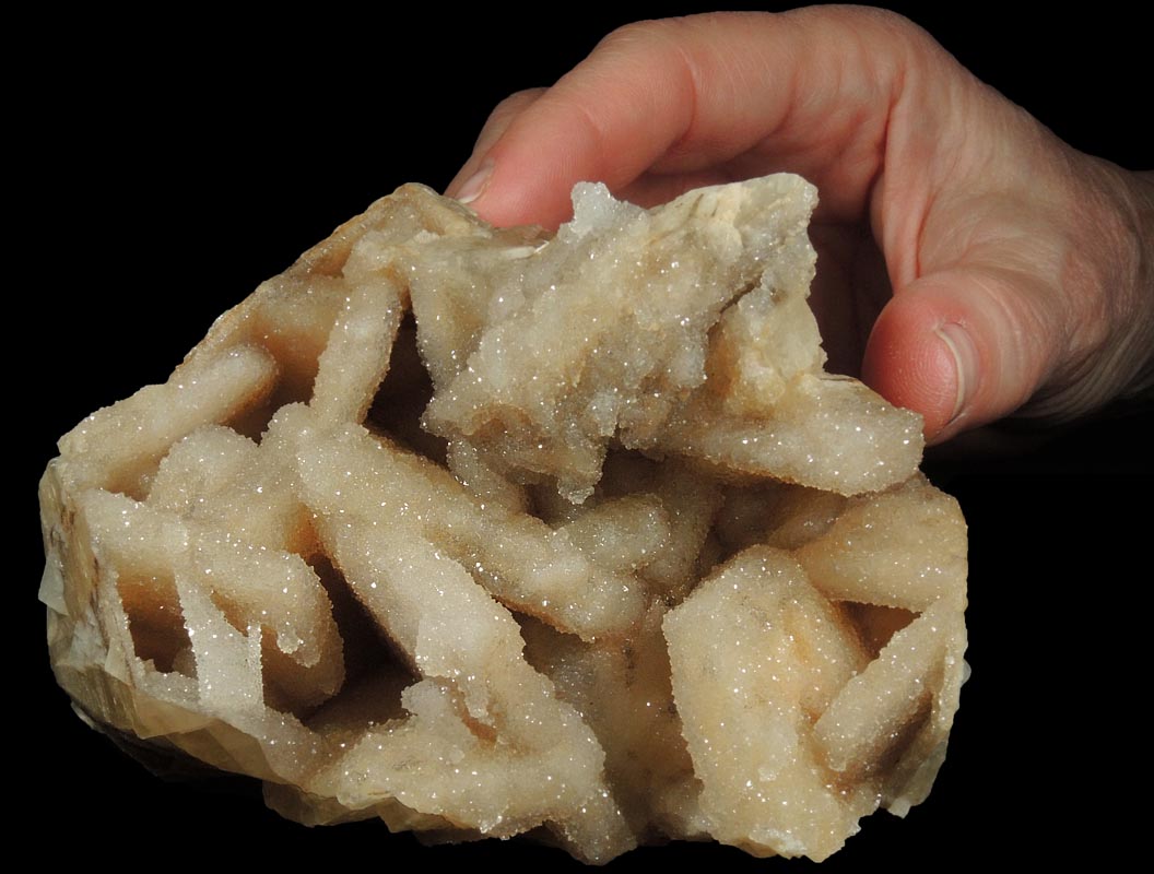 Calcite with Quartz coating from Hudson River Railroad tunnel, Anthony's Nose, east shore of Hudson River, Westchester County, New York