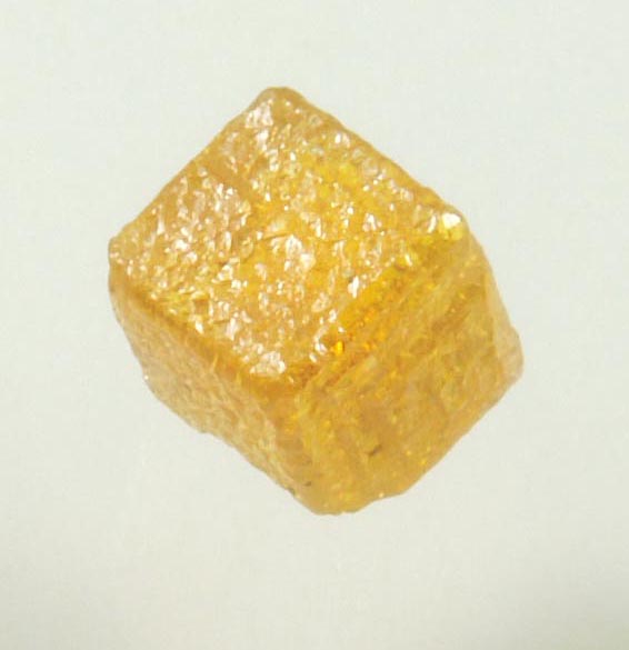 Diamond (0.66 carat uncut fancy-intense yellow cubic uncut rough diamond) from Mbuji-Mayi, 300 km east of Tshikapa, Democratic Republic of the Congo