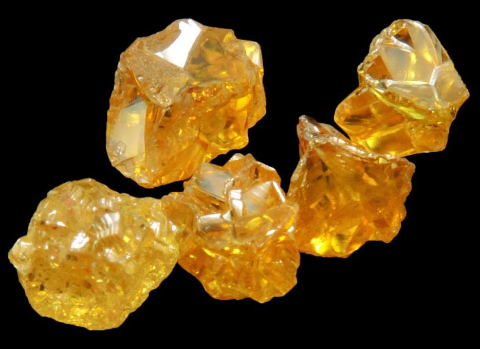 Diamond (five uncut fancy-yellow cavernous uncut rough diamonds totaling 2.93 carats) from Mbuji-Mayi, 300 km east of Tshikapa, Democratic Republic of the Congo