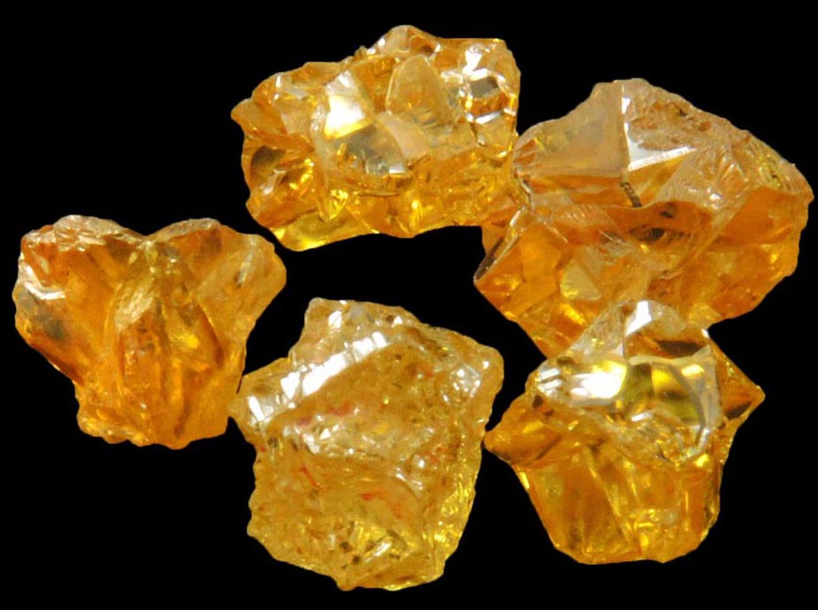 Diamond (five uncut fancy-yellow cavernous uncut rough diamonds totaling 2.93 carats) from Mbuji-Mayi, 300 km east of Tshikapa, Democratic Republic of the Congo