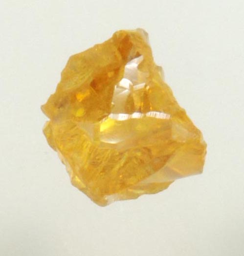 Diamond (0.51 carat uncut fancy-yellow cavernous uncut rough diamond) from Mbuji-Mayi, 300 km east of Tshikapa, Democratic Republic of the Congo