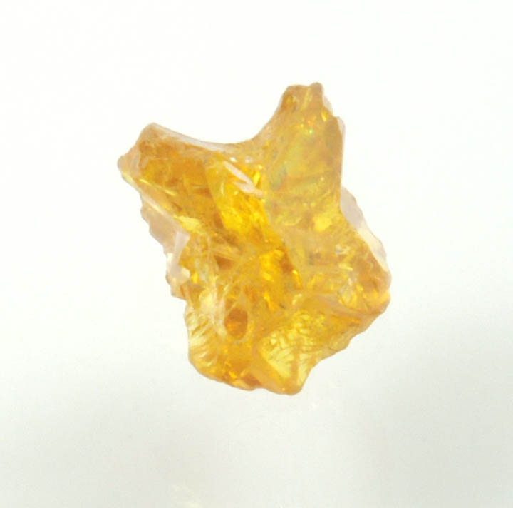Diamond (0.56 carat uncut fancy intense yellow cavernous uncut diamond) from Mbuji-Mayi, 300 km east of Tshikapa, Democratic Republic of the Congo