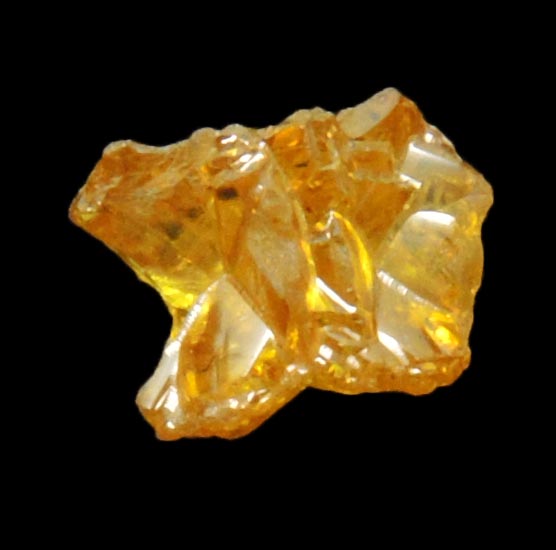 Diamond (0.56 carat uncut fancy intense yellow cavernous uncut diamond) from Mbuji-Mayi, 300 km east of Tshikapa, Democratic Republic of the Congo