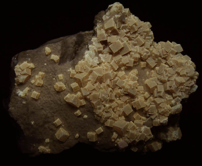Photo below under shortwave ultraviolet illumination of Fluorite with Celestine and Calcite from Clay Center, Ottawa County, Ohio Fluorite with Celestine and Calcite from Clay Center, Ottawa County, Ohio