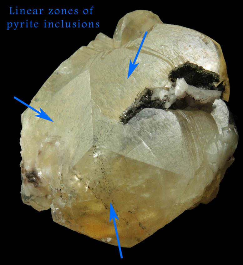 Calcite with linear zones of Pyrite inclusions from Eastern Rock Products Quarry (Benchmark Quarry), St. Johnsville, Montgomery County, New York
