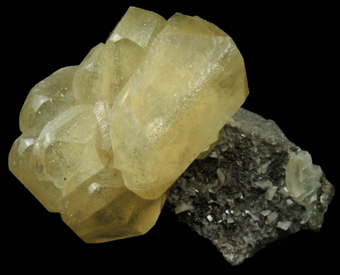 Calcite with linear zones of Pyrite inclusions from Eastern Rock Products Quarry (Benchmark Quarry), St. Johnsville, Montgomery County, New York