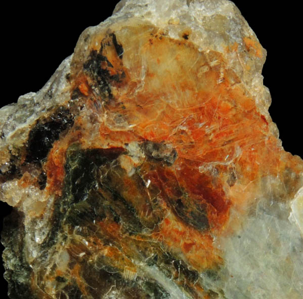 Muscovite with Cacoxenite-Bermanite inclusions from Prospect No. 28 (Two Bit prospect), Rockford, Coosa County, Alabama