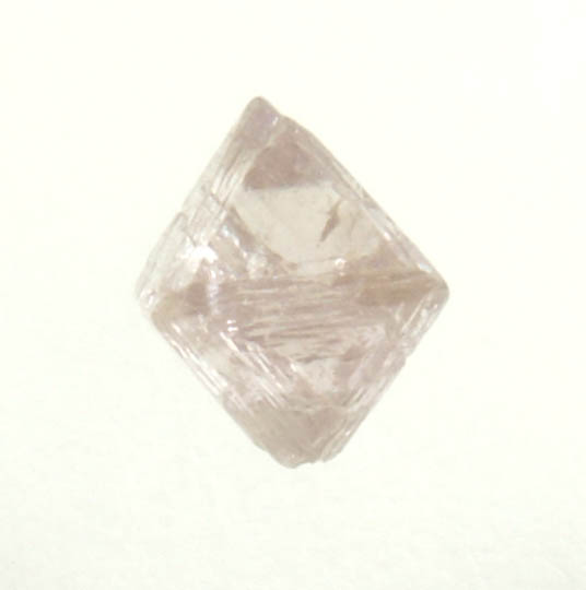 Diamond (0.38 carat pink octahedral rough diamond) from Argyle Mine, Kimberley, Western Australia, Australia