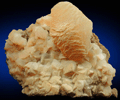 Calcite (twinned crystals) on Calcite from Taff's Well Quarry, 9 km northwest of Cardiff, Pentyrch, MidGlamorgan, Wales