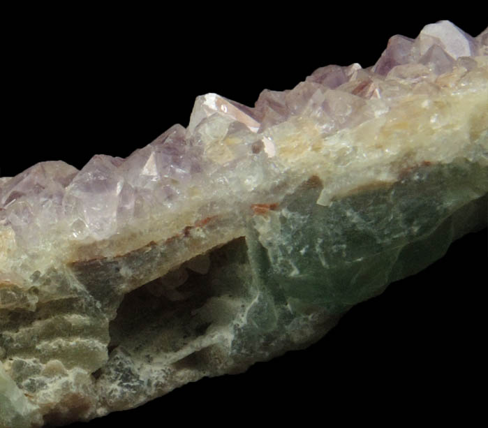 Quartz var. Amethyst on Fluorite from Unaweep Canyon, 23.5 km south of Grand Junction, Mesa County, Colorado