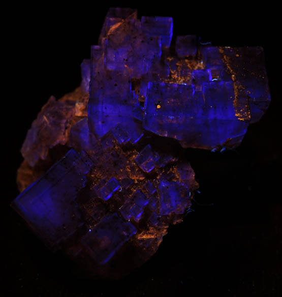 Photo below under longwave ultraviolet illumination of Fluorite with Chalcopyrite from Cave-in-Rock District, Hardin County, Illinois Fluorite with Chalcopyrite from Cave-in-Rock District, Hardin County, Illinois