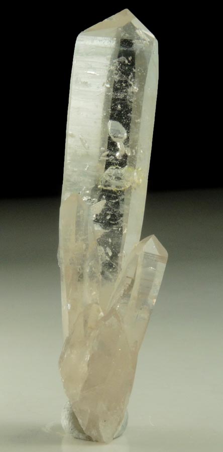 Quartz with negative crystal cavities and inclusions from Biedell Creek Quartz Prospects, Crystal Hill, 12.5 km northwest of La Garita, Saguache County, Colorado