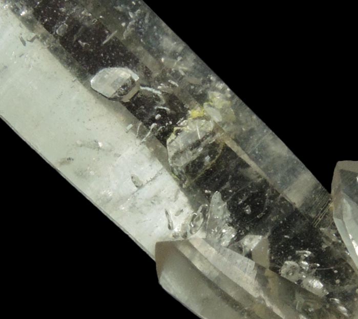 Quartz with negative crystal cavities and inclusions from Biedell Creek Quartz Prospects, Crystal Hill, 12.5 km northwest of La Garita, Saguache County, Colorado