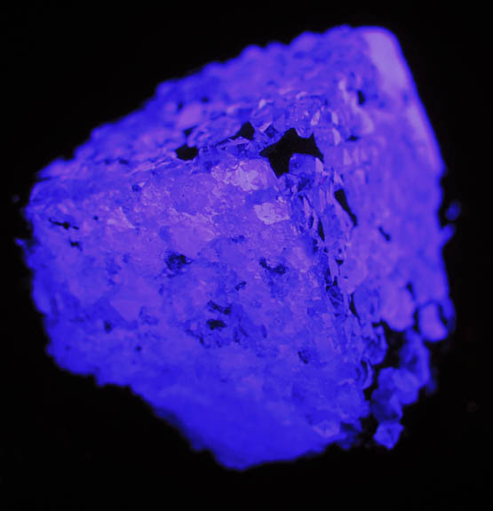 Photo below under longwave ultraviolet illumination of Quartz and Pyrite over Fluorite from Samine Fluorite Mine, Djebel el Hammam, 44 km southwest of Meknes, Morocco Quartz and Pyrite over Fluorite from Samine Fluorite Mine, Djebel el Hammam, 44 km southwest of Meknes, Morocco