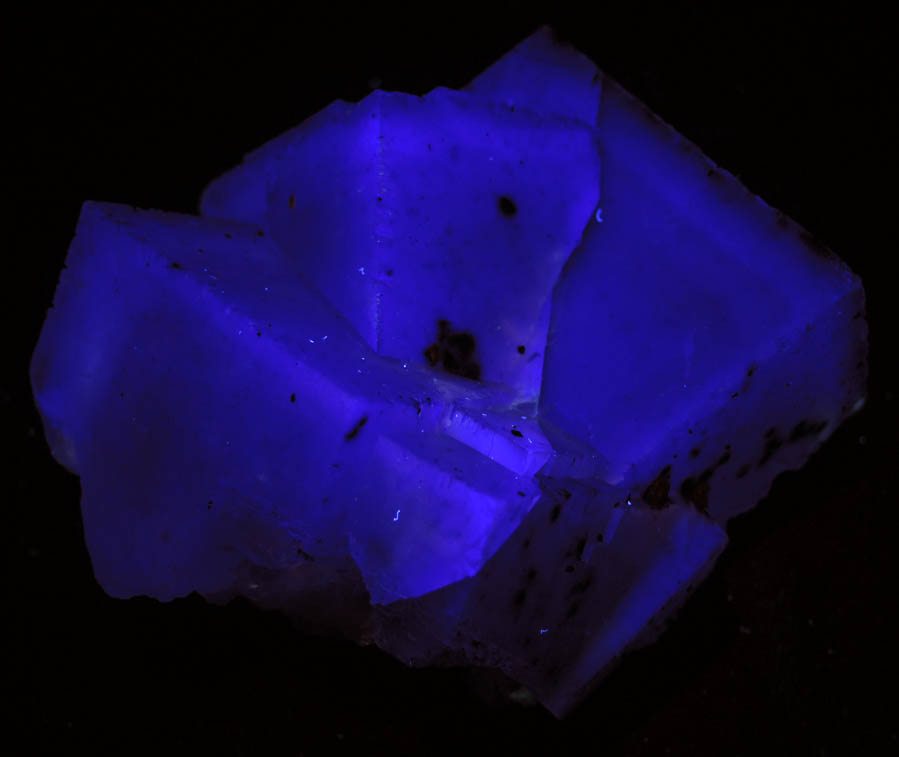 Photo below under longwave ultraviolet illumination of Fluorite from Cave-in-Rock District, Hardin County, Illinois Fluorite from Cave-in-Rock District, Hardin County, Illinois