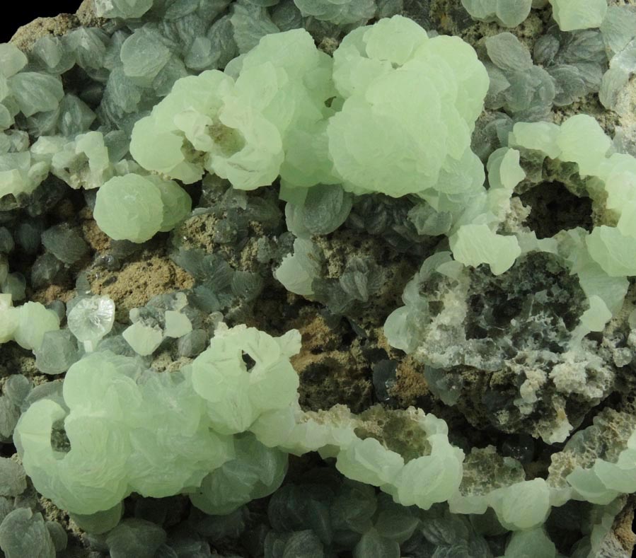 Prehnite with pseudomorphic molds after Laumontite from Fawn Drive, Livingston, Essex County, New Jersey