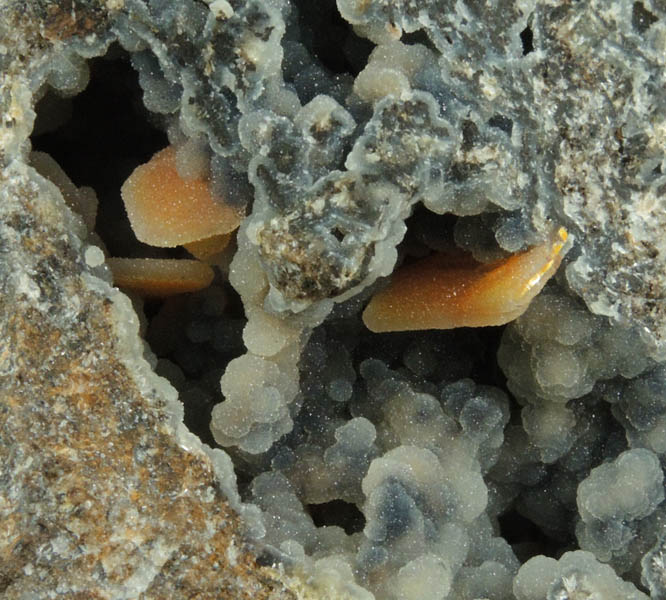 Wulfenite and Hemimorphite with Quartz coating from Finch Mine, north of Hayden, Banner District, Gila County, Arizona