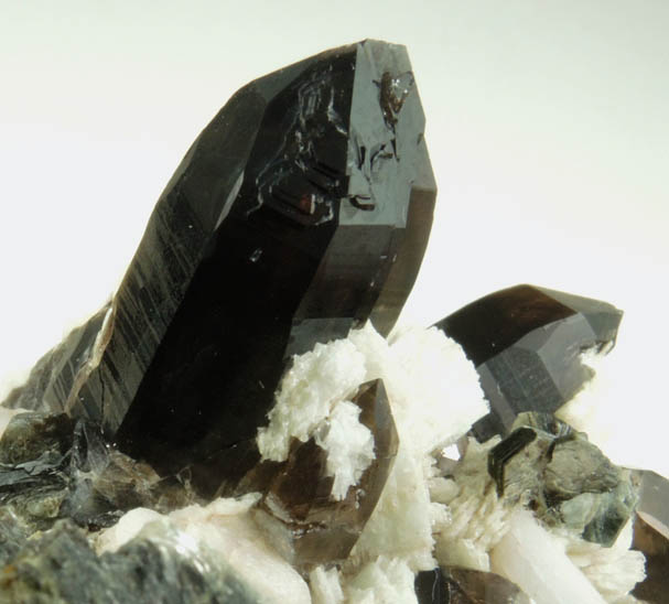 Quartz var. Smoky Quartz on Microcline with Muscovite from Moat Mountain, Oliver Diggings, Hale's Location, west of North Conway, Carroll County, New Hampshire