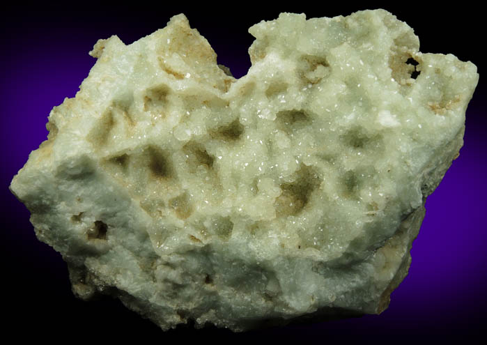 Datolite with pseudomorphic molds after Quartz from Millington Quarry, Bernards Township, Somerset County, New Jersey