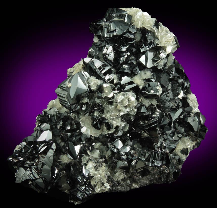 Cassiterite on Muscovite from Xuebaoding Mountain, near Pingwu, Sichuan Province, China