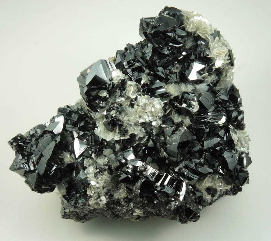 Cassiterite on Muscovite from Xuebaoding Mountain, near Pingwu, Sichuan Province, China