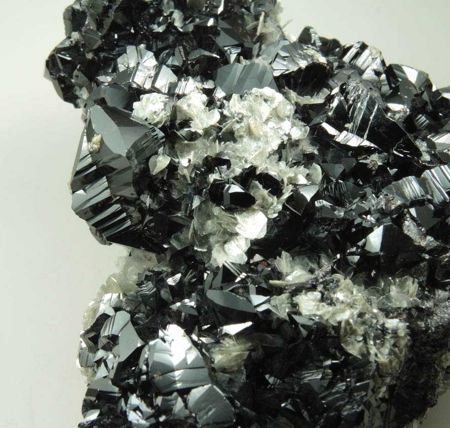 Cassiterite on Muscovite from Xuebaoding Mountain, near Pingwu, Sichuan Province, China