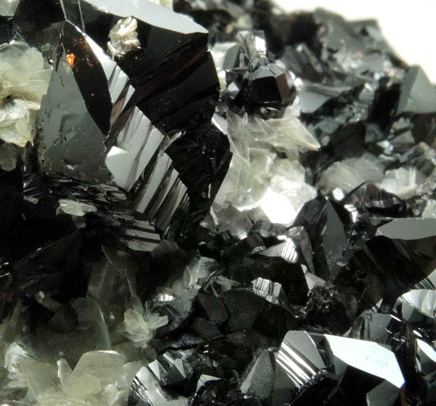 Cassiterite on Muscovite from Xuebaoding Mountain, near Pingwu, Sichuan Province, China