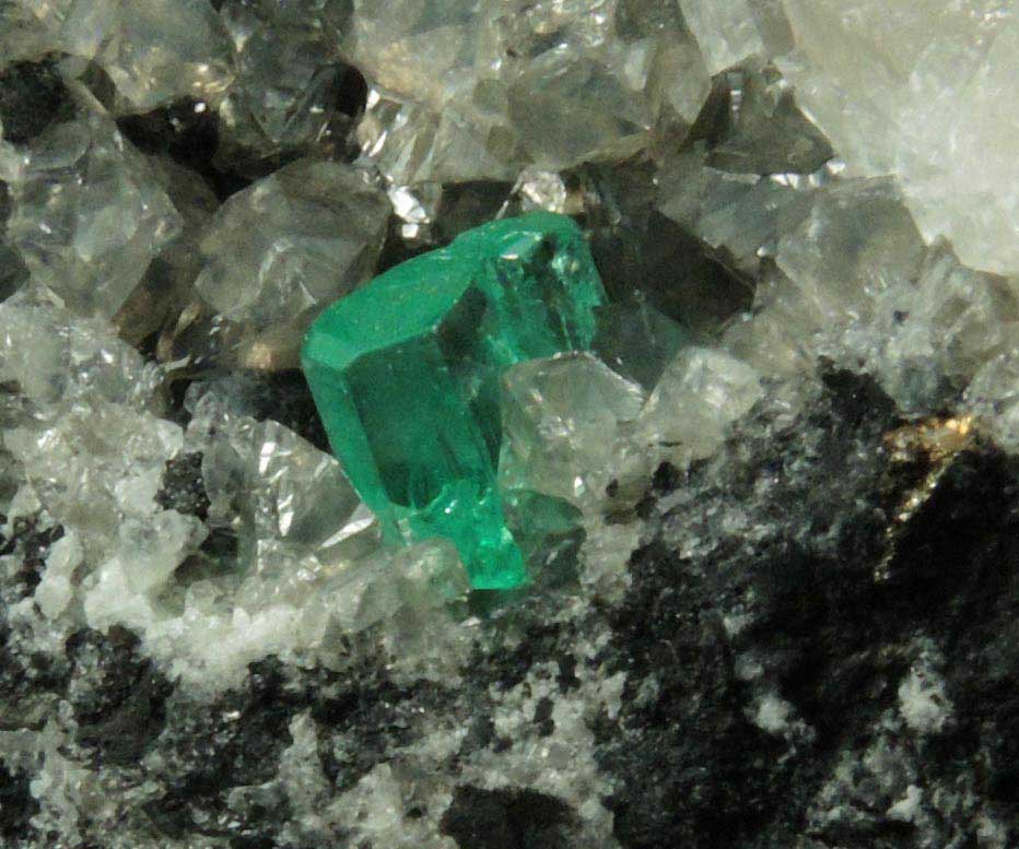 Beryl var. Emerald on Calcite from Muzo Mine, Vasquez-Yacopi Mining District, Boyac Department, Colombia