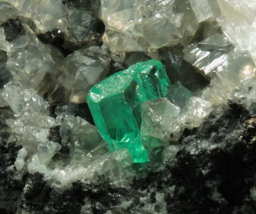 Beryl var. Emerald on Calcite from Muzo Mine, Vasquez-Yacopi Mining District, Boyac Department, Colombia