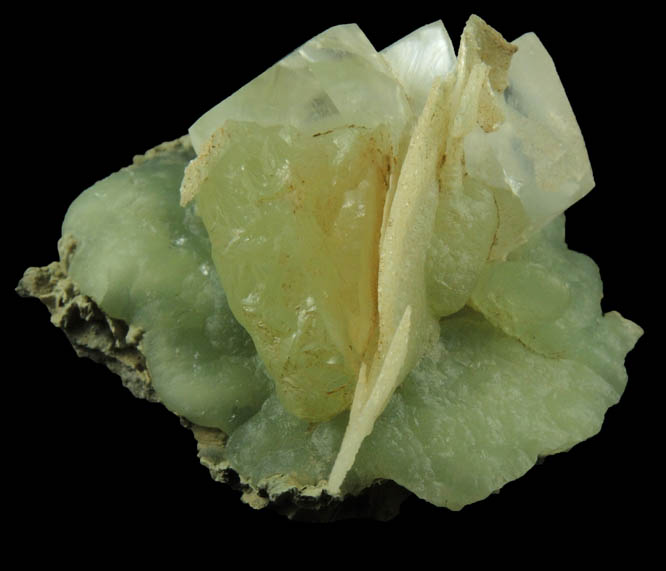 Calcite on Prehnite with pseudomorphic cavities after Calcite from Millington Quarry, Bernards Township, Somerset County, New Jersey