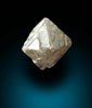 Diamond (0.70 carat pink-gray octahedral rough diamond) from Argyle Mine, Kimberley, Western Australia, Australia
