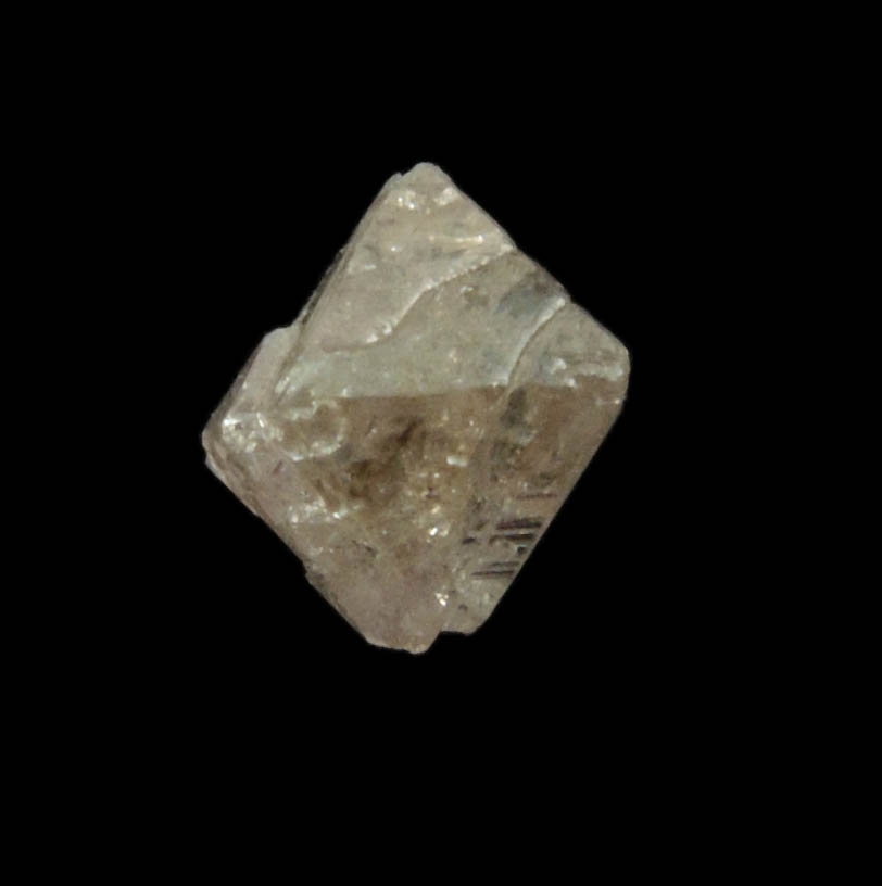 Diamond (0.70 carat pink-gray octahedral rough diamond) from Argyle Mine, Kimberley, Western Australia, Australia