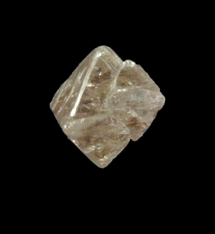 Diamond (0.70 carat pink-gray octahedral rough diamond) from Argyle Mine, Kimberley, Western Australia, Australia