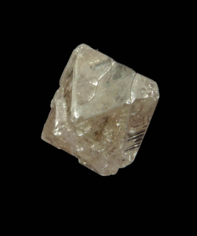 Diamond (0.70 carat pink-gray octahedral rough diamond) from Argyle Mine, Kimberley, Western Australia, Australia