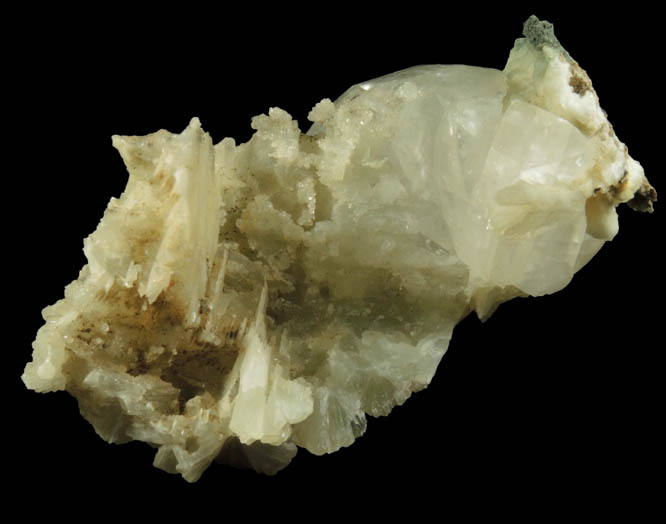 Calcite on Prehnite with pseudomorphic molds after Anhydrite from Millington Quarry, Bernards Township, Somerset County, New Jersey