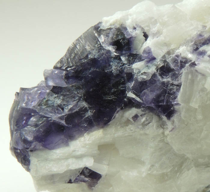 Fluorite in marble from Lime Crest Quarry (Limecrest), Sussex Mills, 4.5 km northwest of Sparta, Sussex County, New Jersey