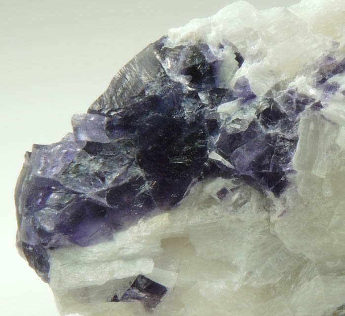 Fluorite in marble from Lime Crest Quarry (Limecrest), Sussex Mills, 4.5 km northwest of Sparta, Sussex County, New Jersey