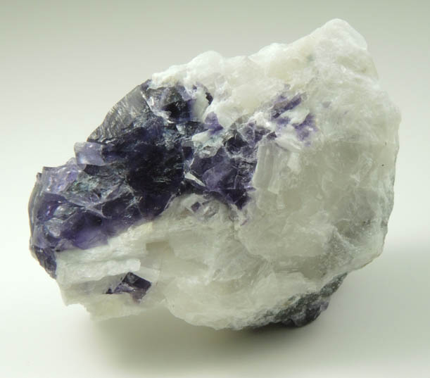 Fluorite in marble from Lime Crest Quarry (Limecrest), Sussex Mills, 4.5 km northwest of Sparta, Sussex County, New Jersey