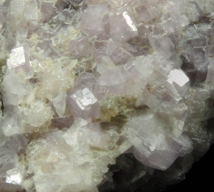 Fluorapatite var. Purple Apatite on columnar Muscovite from Emmons Quarry, southeastern slope of Uncle Tom Mountain,  Greenwood, Oxford County, Maine