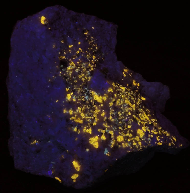 Norbergite and Graphite in marble from Lime Crest Quarry (Limecrest), Sussex Mills, 4.5 km northwest of Sparta, Sussex County, New Jersey