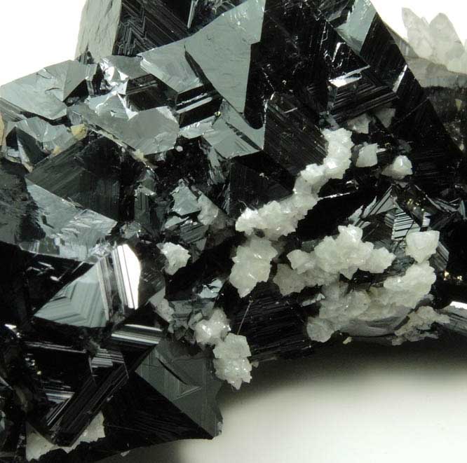 Sphalerite (Spinel Law twinned crystals) with Quartz and Calcite from Stantrg Mine, Trepca District, 7.5 km northeast of Kosozska Mitrovica, Kosovo